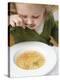 Small Girl Eating Soup with Teddy Bear Pasta-null-Premier Image Canvas