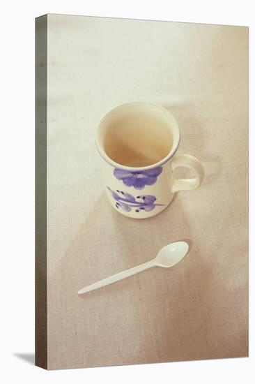 Small Mug and Plastic Spoon-Den Reader-Premier Image Canvas