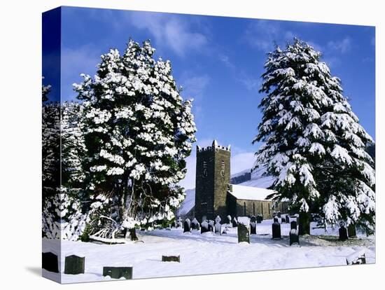 Snow Covered Church and Cemetery-Ashley Cooper-Premier Image Canvas