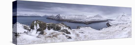 Snow covered mountain scenery above Funningsfjørdur on the island of Eysturoy, Faroe Islands, Denma-Adam Burton-Premier Image Canvas