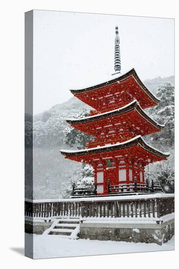 Snow falling on small red pagoda, Kiyomizu-dera Temple, UNESCO World Heritage Site, Kyoto, Japan, A-Damien Douxchamps-Premier Image Canvas