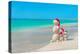 Snowmans Family at Sea Beach in Santa Hat. New Years and Christmas-EMprize-Premier Image Canvas