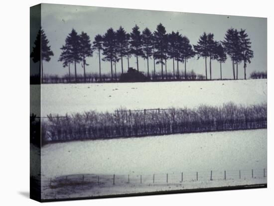 Snowy Landscape Frames Single American Tank Moving Along Distant Road During Battle of the Bulge-George Silk-Premier Image Canvas