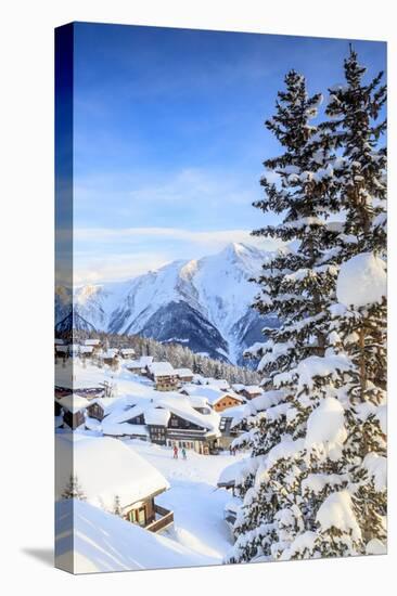 Snowy Woods and Mountain Huts Framed by the Winter Sunset, Bettmeralp, District of Raron-Roberto Moiola-Premier Image Canvas