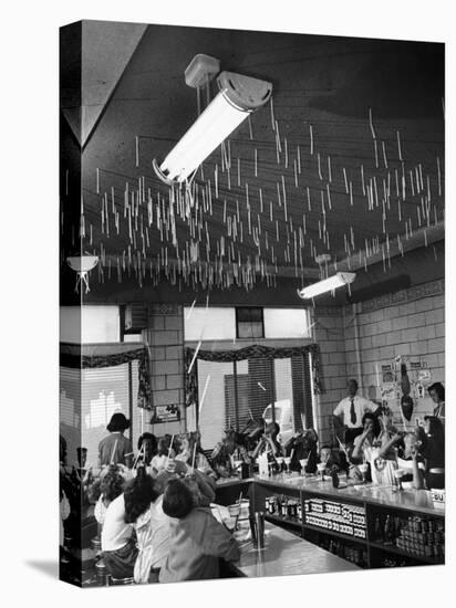 Soda Fountain Proprietor Watching as Kids Use Drinking Straw Covers as Straw Blowgun Missiles-Wallace Kirkland-Premier Image Canvas