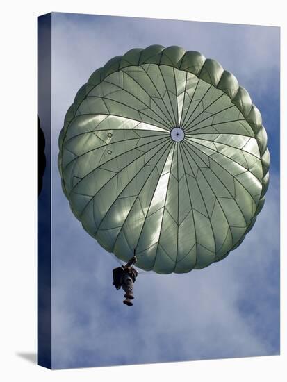 Soldier of the 82nd Airborne Descends from a Parachute Drop Over, 2010-null-Stretched Canvas
