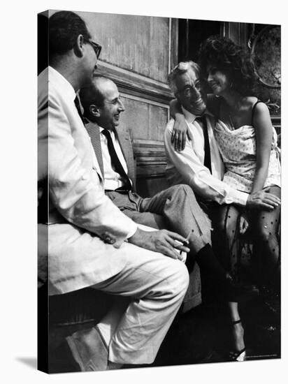 Sophia Loren Sitting on Director Vittorio de Sica's Lap During Filming "Marriage, Italian Style"-Alfred Eisenstaedt-Premier Image Canvas