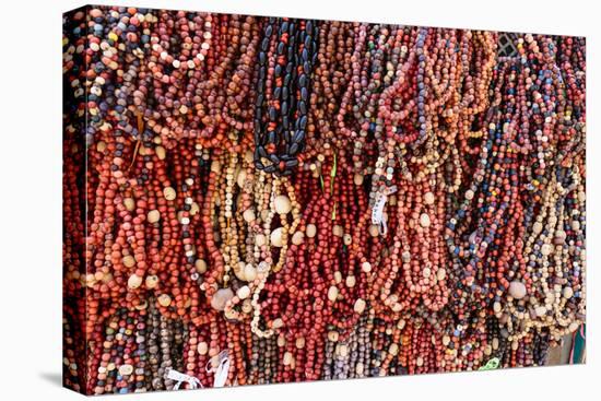 South America, Brazil, Salvador. Close-up of beads made of acai berries.-Alida Latham-Premier Image Canvas