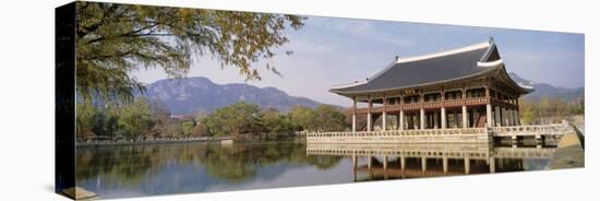 South Korea, Seoul, Kyongheru, View of Traditional Architecture on a Lake-null-Premier Image Canvas