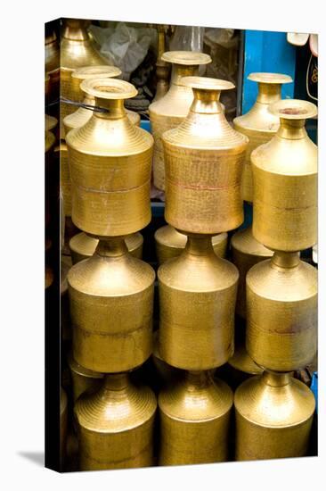 Stack of beautiful brass milk jugs or pots in Durbar Square in center of village of Kathmandu Nepal-Bill Bachmann-Premier Image Canvas