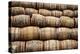 Stacked Pile of Old Whisky and Wine Wooden Barrels-MartinM303-Premier Image Canvas