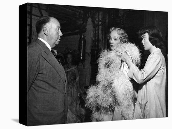 STAGE FRIGHT, 1950 directed by ALFRED HITCHCOCK On the set, Alfred Hitchcock, Marlene Dietrich and -null-Stretched Canvas