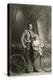 Standing Bicyclist with Little Girl on Handlebars-null-Stretched Canvas