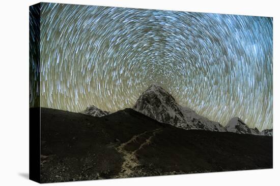 Star trails over Pumori Peak in the Himalayas, Nepal hiking to Everest Base Camp from Gorak Shep-David Chang-Premier Image Canvas