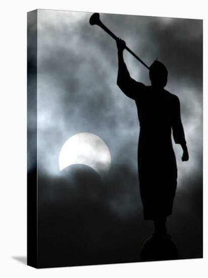 Statue is Seen Against a Cloudy Sky and a Partial Solar Eclipse in Bogota, Colombia-null-Premier Image Canvas