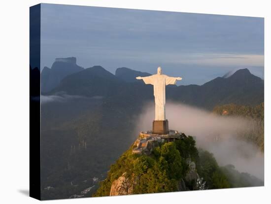 Statue of Jesus, known as Cristo Redentor (Christ the Redeemer), on Corcovado Mountain in Rio De Ja-Peter Adams-Premier Image Canvas