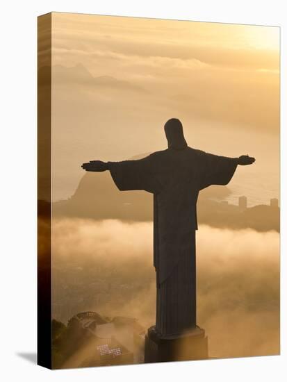 Statue of Jesus, known as Cristo Redentor (Christ the Redeemer), on Corcovado Mountain in Rio De Ja-Peter Adams-Premier Image Canvas