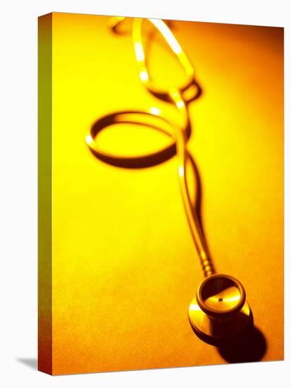 Stethoscope on Yellow Surface-null-Premier Image Canvas