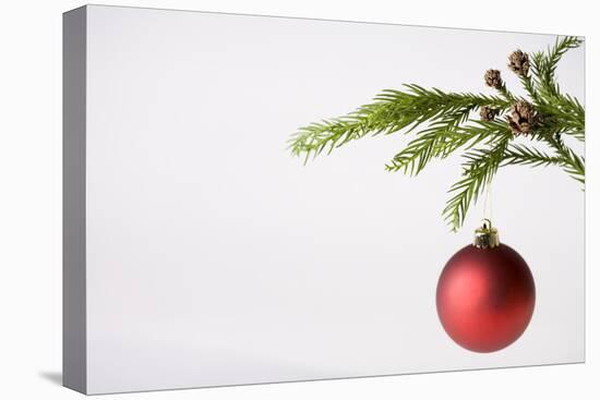 Still Life of Red Bauble Hanging on Christmas Tree-null-Premier Image Canvas