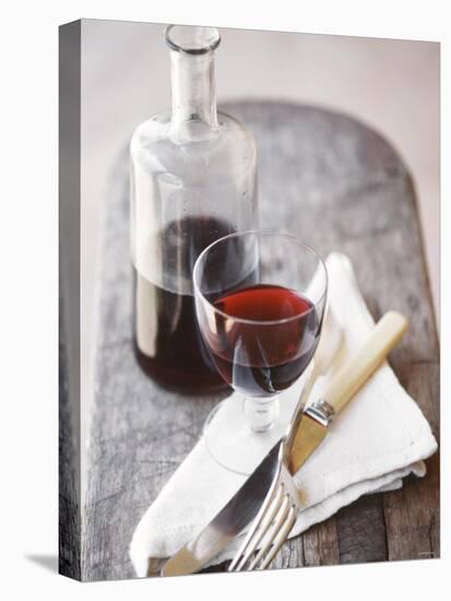 Still Life with Red Wine Glass, Wine Carafe, Napkin and Cutlery-Jean Cazals-Premier Image Canvas