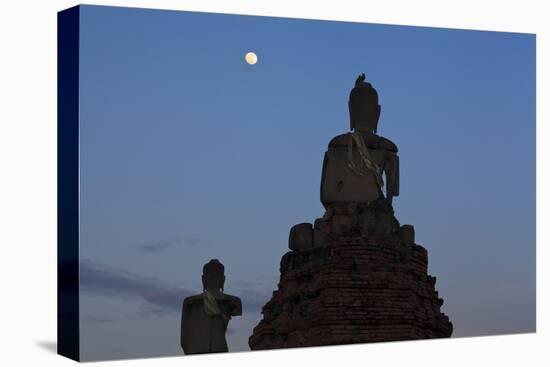 Stone Buddhas With Common Myna (Acridotheres Tristis) On Top And Moon. Thailand-Oscar Dominguez-Premier Image Canvas