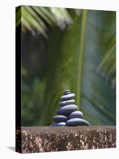 Stones Balanced on Rock, Palm Trees in Background, Maldives, Indian Ocean-Papadopoulos Sakis-Premier Image Canvas