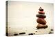 Stones Pyramid on Sand Symbolizing Zen, Harmony, Balance. Ocean in the Background-Michal Bednarek-Premier Image Canvas