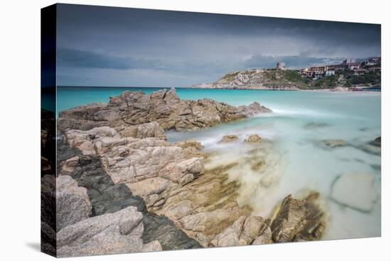 Storm clouds frame the village overlooking the turquoise sea, Santa Teresa di Gallura, Italy-Roberto Moiola-Premier Image Canvas