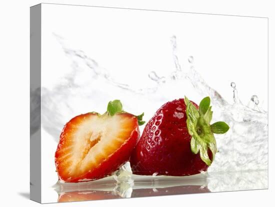 Strawberries with Splashing Water-Michael L?ffler-Premier Image Canvas