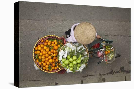 Street vendor with baskets of fruit on bicycle, Old Quarter, Hanoi, Vietnam-David Wall-Premier Image Canvas