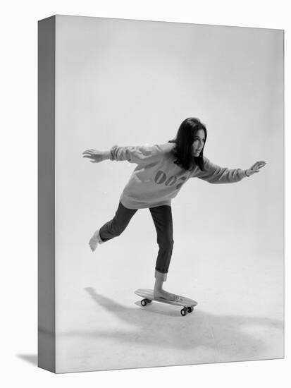 Studio Photos of Gloria Steinem Riding a Skateboard with a 007 James Bond Sweatshirt, 1965-Yale Joel-Premier Image Canvas