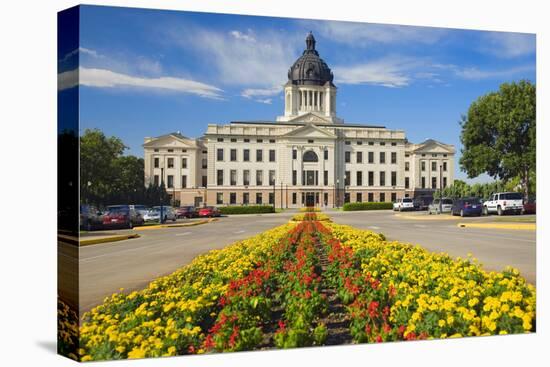 Summer flower-bed leading to South Dakota State Capitol and complex, Pierre, South Dakota, was b...-null-Premier Image Canvas