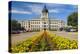 Summer flower-bed leading to South Dakota State Capitol and complex, Pierre, South Dakota, was b...-null-Premier Image Canvas