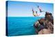 Summer Fun, Friends Cliff Jumping into the Ocean.-EpicStockMedia-Premier Image Canvas