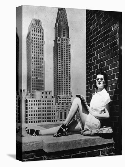 Sunbathing in a Highrise in New York-null-Premier Image Canvas