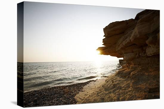 Sundown on the stone beach island Kos, Greece,-Rasmus Kaessmann-Premier Image Canvas