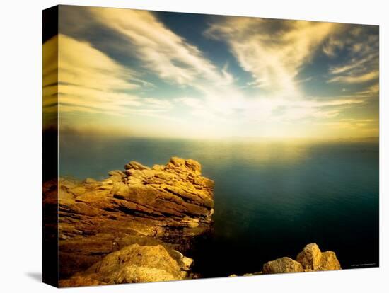 Sunlight Reflecting off Blue Waters off Cliffside-Jan Lakey-Premier Image Canvas