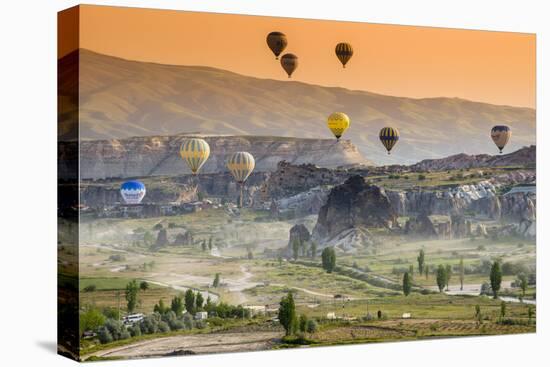 Sunrise Landscape with Hot Air Balloons, Goreme, Cappadocia, Turkey-Stefano Politi Markovina-Premier Image Canvas