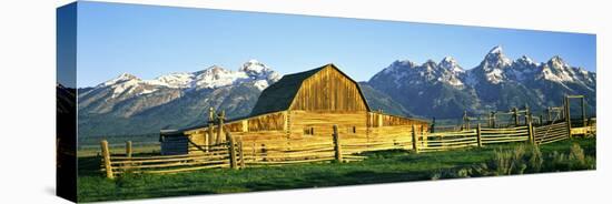 Sunrise over the Moulton Barn Along Mormon Row, Teton Range, Mormon Row Historic District-null-Premier Image Canvas