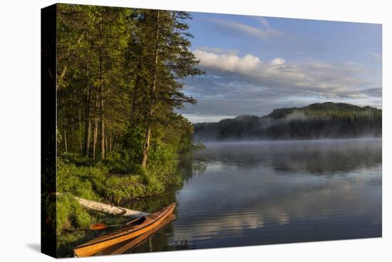 Sunrise with Kayak on Beaver Lake in the Stillwater State Forest Near Whitefish, Montana, Usa-Chuck Haney-Premier Image Canvas