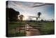 Sunset at the Gate of a Bonito Farm, with Rolling Hills in the Background-Alex Saberi-Premier Image Canvas