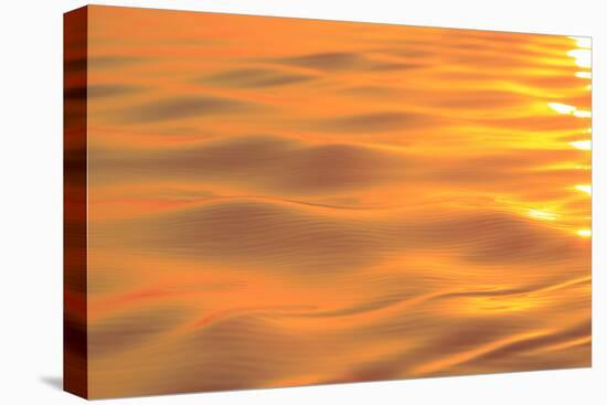 Sunset colors and patterns on small waves in water.-Stuart Westmorland-Premier Image Canvas