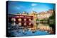 Sunset over the iconic Ponte Vecchio bridge reflected in river Brenta, Bassano Del Grappa-Roberto Moiola-Premier Image Canvas