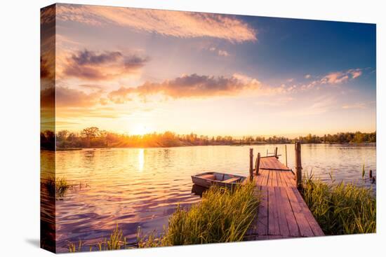 Sunset over the Lake in the Village. View from a Wooden Bridge, Image in the Orange-Purple Toning-null-Premier Image Canvas