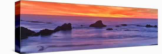 Sunset over the Pacific Ocean from Seal Rock along the Oregon Coast.-Darrell Gulin-Premier Image Canvas