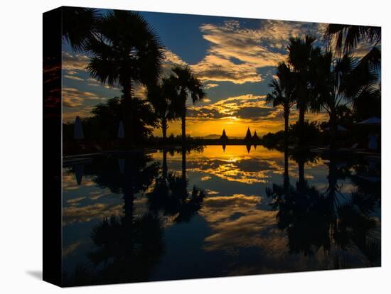 Sunset reflected in the infinity pool at Aureum Palace Hotel, Bagan, Mandalay Region, Myanmar-null-Premier Image Canvas