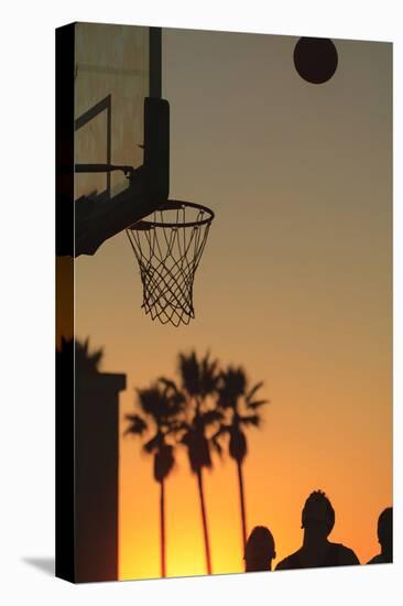 Sunset scenes, Venice Beach, Southern California, USA. Outdoor basketball court-Stuart Westmorland-Premier Image Canvas