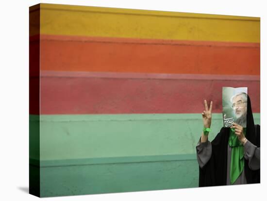 Supporter of Mir Hossein Mousavi Hides Her Face as She Waits at an Election Rally in Tehran-null-Premier Image Canvas