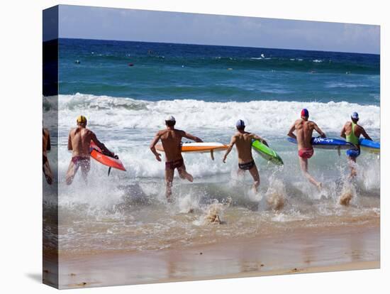 Surf Lifesavers Sprint for Water During a Rescue Board Race at Cronulla Beach, Sydney, Australia-Andrew Watson-Premier Image Canvas