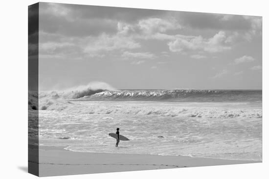 Surfer standing on the beach, North Shore, Oahu, Hawaii, USA-null-Premier Image Canvas